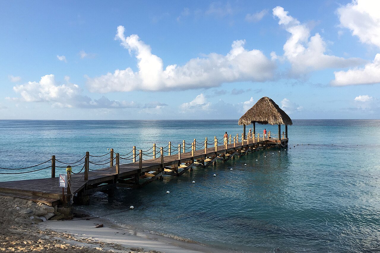 Wooden pier over blue water in Dominicus
